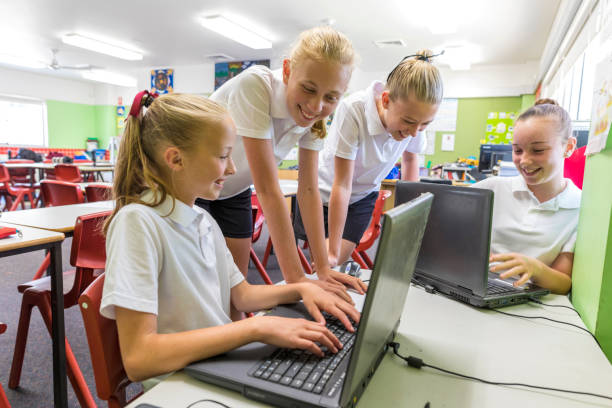istock Education of Junior High School Girl Students Using Computers 858591686