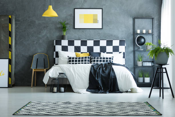 istock Bedroom with yellow poster 858599458