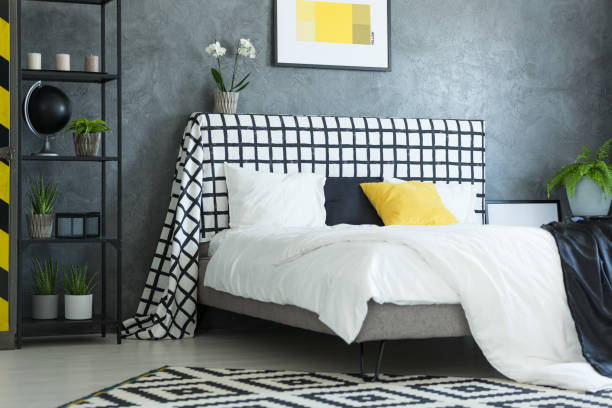 istock Scandinavian bedroom with white orchid 858599460