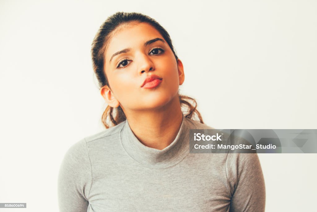 Funny Attractive Indian Girl With Puckered Lips Stock Photo - Download  Image Now - Adult, Adults Only, Authority - iStock