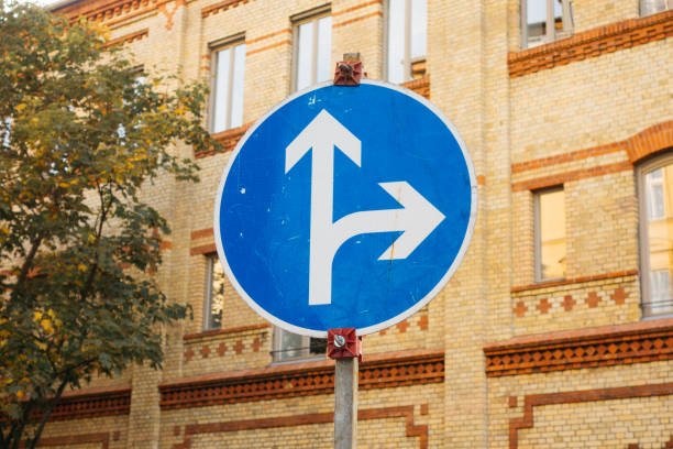 istock blue traffic sign with white arrows 858602892