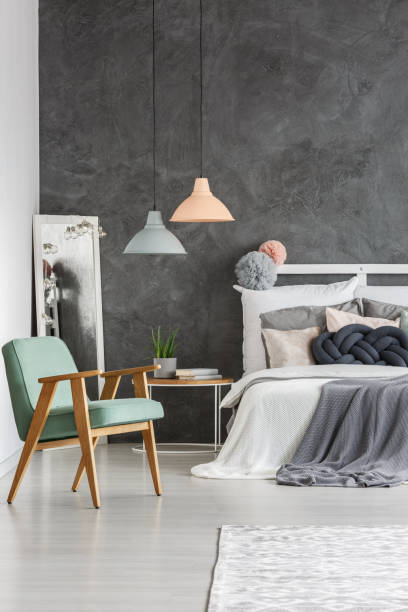istock Vintage mint chair in bedroom 858602954