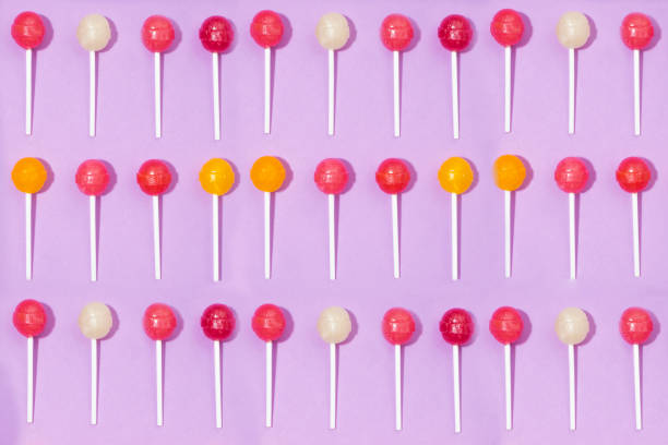 istock Colorful Lollipops on pink background 858606702