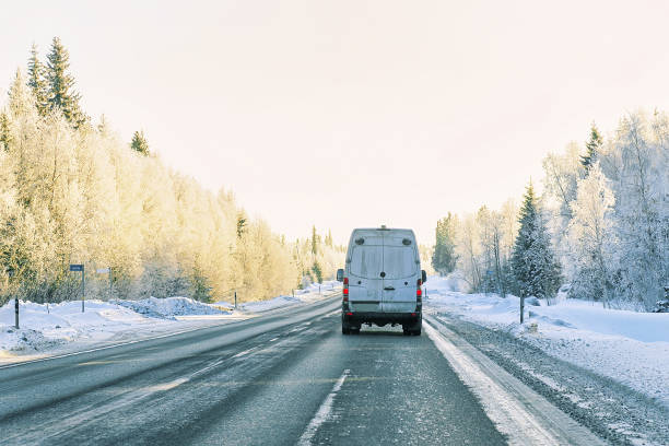 istock Minivan on road in winter Rovaniemi 858607740