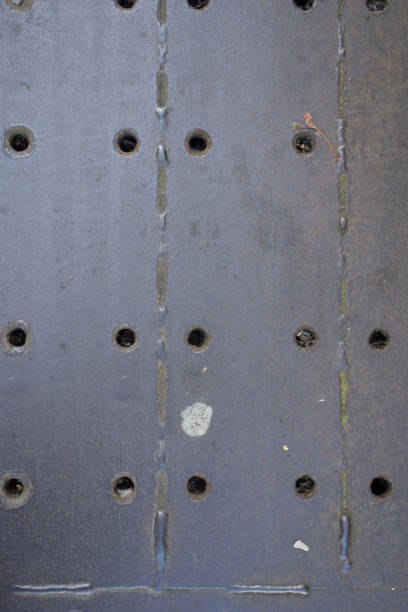 istock Close Up of A Manhole Gutter Pavement Cover 858607768