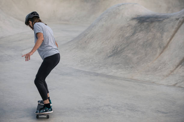 istock Senior women studying skateboarding. 858614554