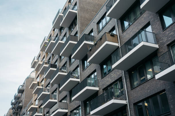 istock apartment house with darken brick facade 858614584