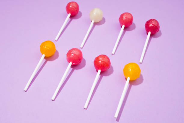 istock Colorful Lollipops on pink background 858615470