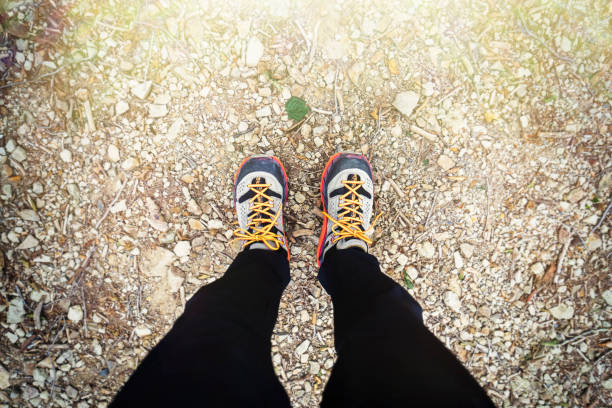 walking brown boots with sturdy soles on a white background