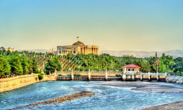 view of dushanbe with presidential palace and the varzob river. tajikistan, central asia - tajik flag imagens e fotografias de stock