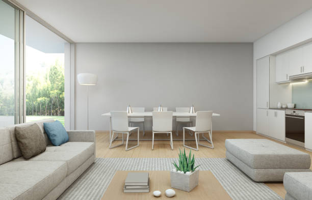 blick auf den garten küche, ess- und wohnzimmer im luxus-haus in modernem design, ferienhaus für große familie - living room blue sofa carpet stock-fotos und bilder