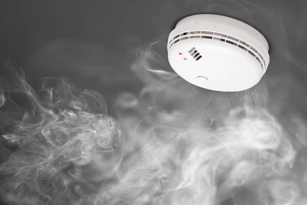 istock smoke detector of fire alarm in action 858627480