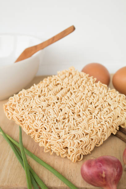istock Dried Instant noodle on the wood table. 858629898