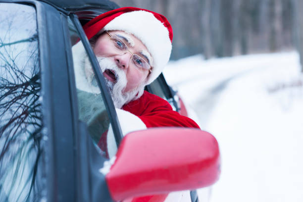 istock Santa Claus at car 858631458