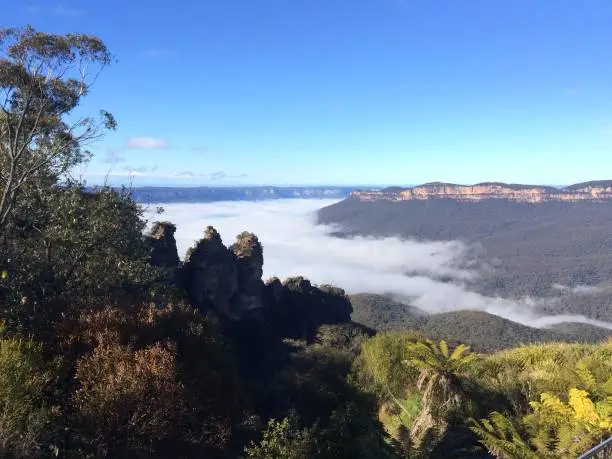 Fog coming into the valley behind the three sisters