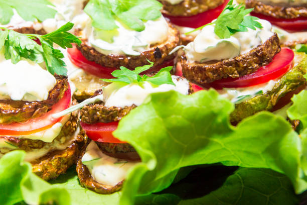 istock Fried zucchini with tomato with garlic sauce. Traditional Russian appetizer. 858638986