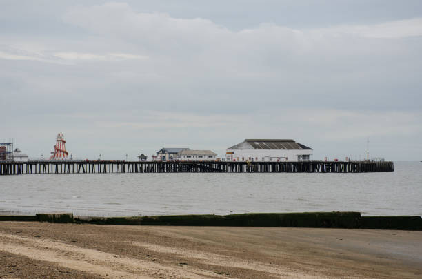 Pier at seaside town out of season Clacton Pier at seaside town out of season at Clacton clacton on sea stock pictures, royalty-free photos & images