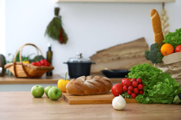 istock Kitchen interiors. Many vegetables and other meal are ready for been cooked soon 858650586