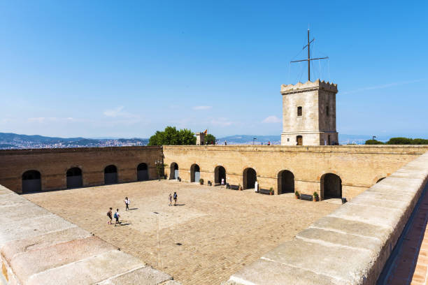 Barcelona, Spain - May 31, 2017: Tower of the castle exterior Montjuic in Barcelona, Spain.