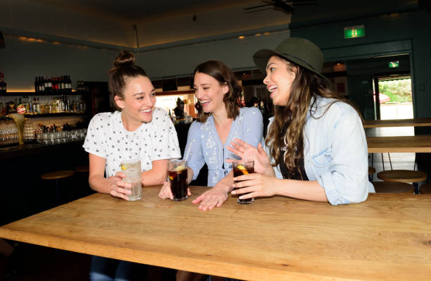 istock Young adults in bar 858658180