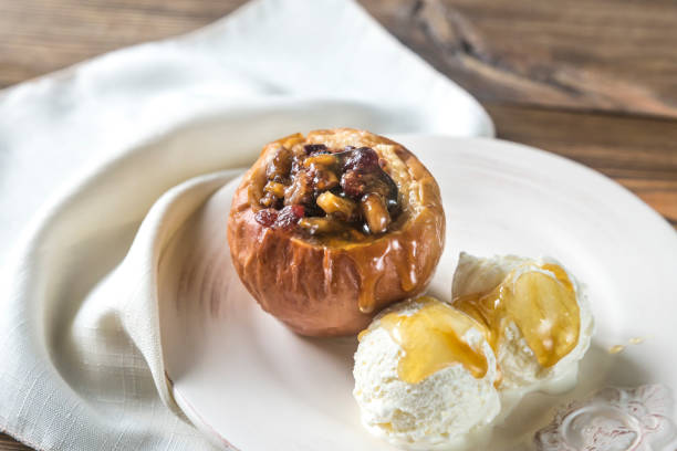 istock Stuffed baked apples on the plate 858662888