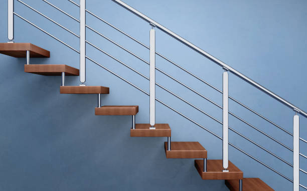 istock Modern wooden staircase with chromed railing. 3d rendering 858663066