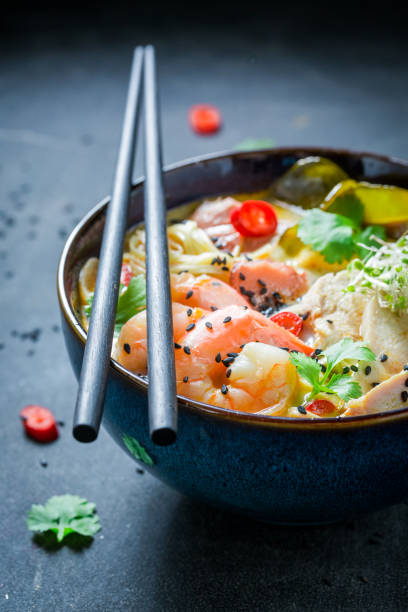 istock Hot Malaysian Soup with chicken and shrimps 858695778