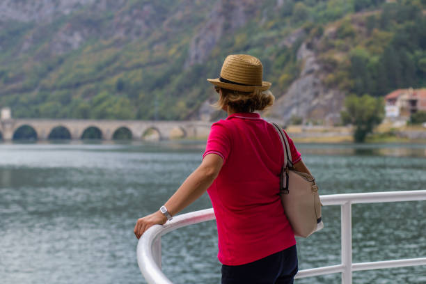 istock Middle age women, sail on a cruiser 858698322
