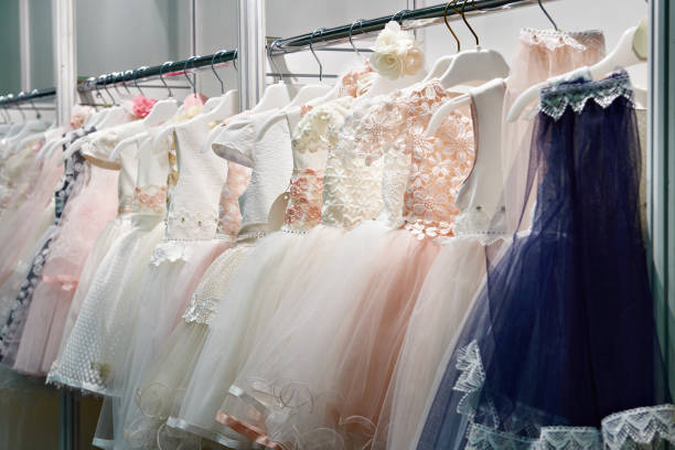 istock Children ballroom dance dresses in store 858698372