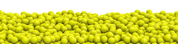 Tennis balls pile panorama stock photo