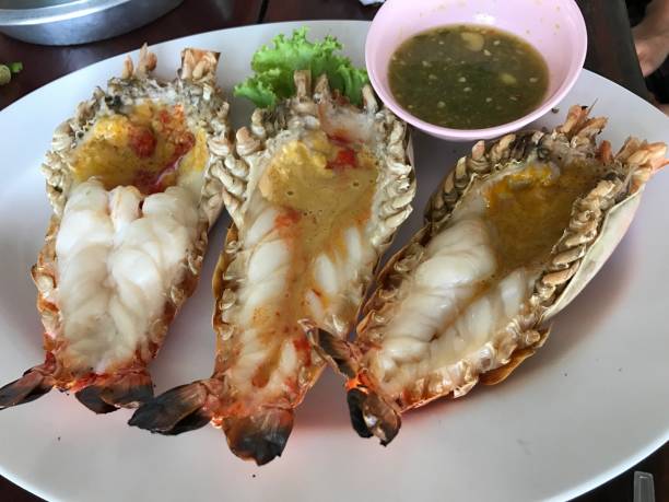 istock Roasted river prawn served with Thai spicy seafood sauce. 858698870