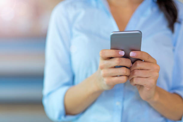 istock Businesswoman using smartphone 858706214