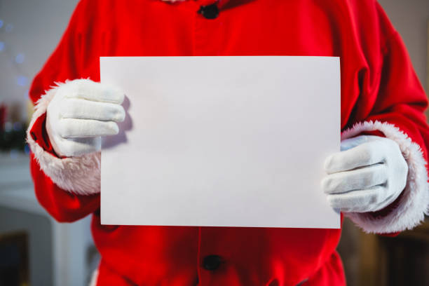 istock Santa claus holding a placard 858706900
