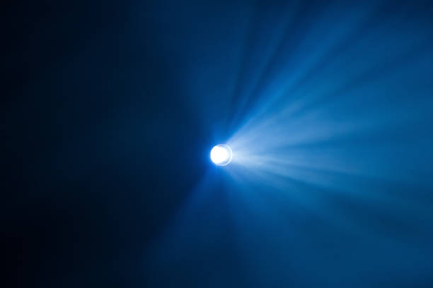 istock Rays theatrical spotlights on the stage during the performance. Lighting equipment. The lighting designer. Theatrical smoke. The art and creativity 858707212