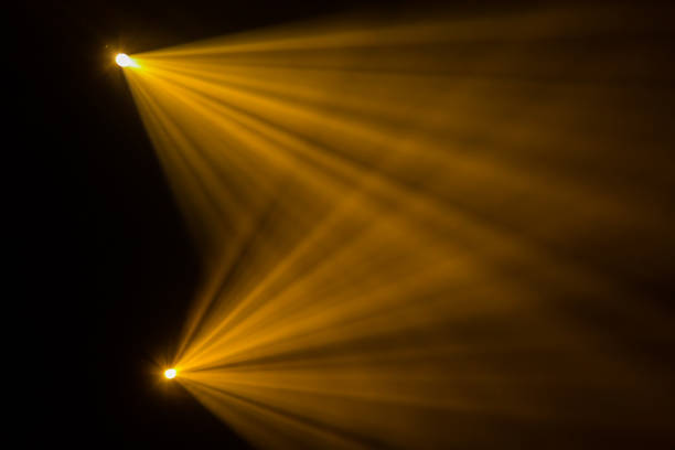 istock Rays theatrical spotlights on the stage during the performance. Lighting equipment. The lighting designer. Theatrical smoke. The art and creativity 858707318