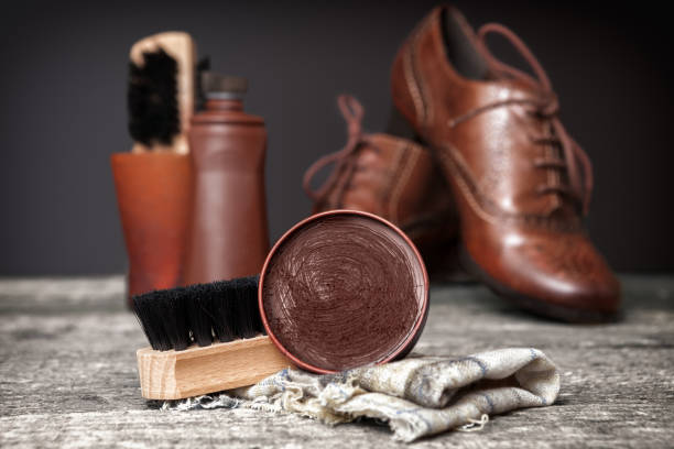 istock Polish cream,brush and dirty cloth 858710786