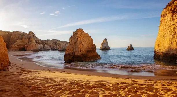 Seascape images of beach in Alvor Portugal in late summer sun