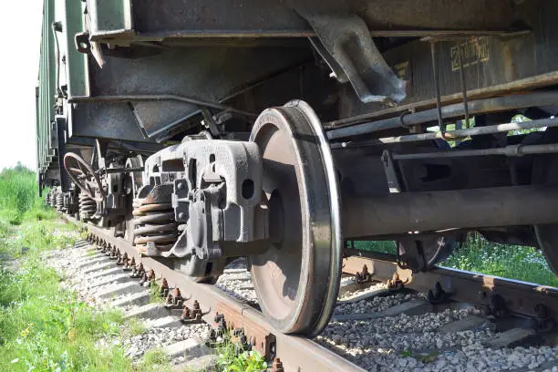 Photo of Wheels of a freight railway car close-up. Russia