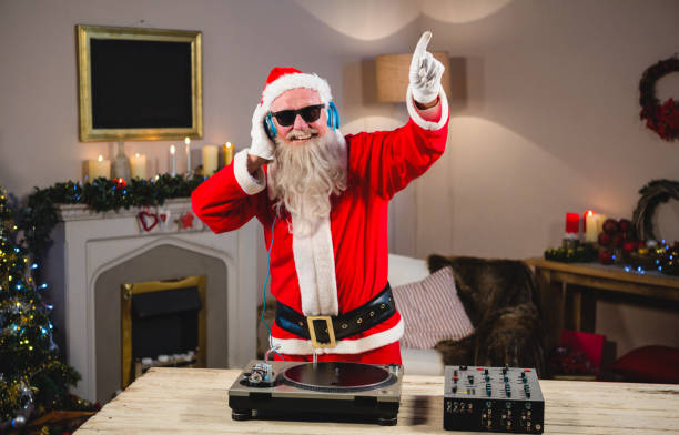 istock Santa claus playing a dj 858725576