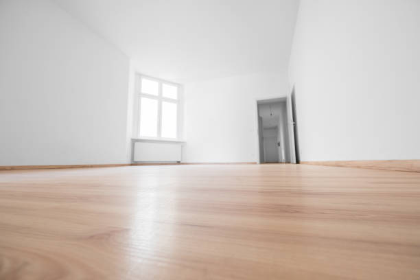 empty room, wooden floor in new apartment stock photo