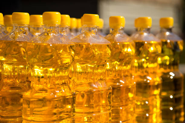 istock yellow vegetable oil in plastic bottles as background 858727088