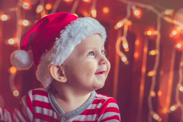 istock Cute child in pajamas in Christmas 858733952