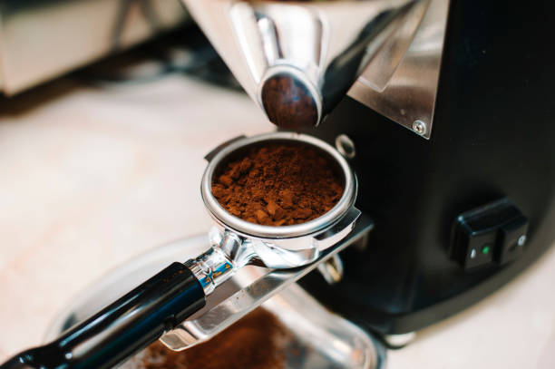 istock coffee grinder grinds freshly roasted coffee beans 858734740