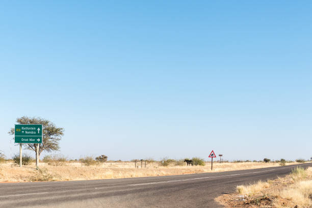 istock Turn-off to Groot Mier in the Northern Cape Province 858738012