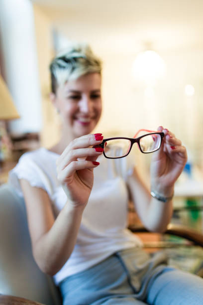 istock Woman in optical optical store 858738256