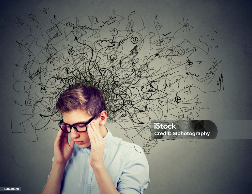Thoughtful stressed man with a mess in his head Teenager Stock Photo