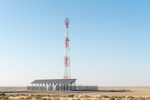 A cell phone telecommunications tower, using solar power only, near Rietfontein, a small town in the Northern Cape Province of South Africa on the border with Namibia