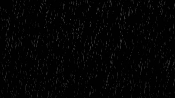 istock Falling raindrops on black background, black and white luminance matte 858756512