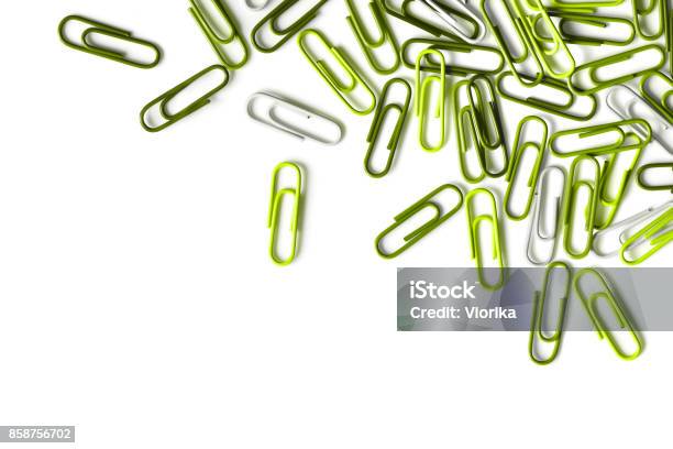 Green Paper Clips On A White Background Stock Photo - Download Image Now