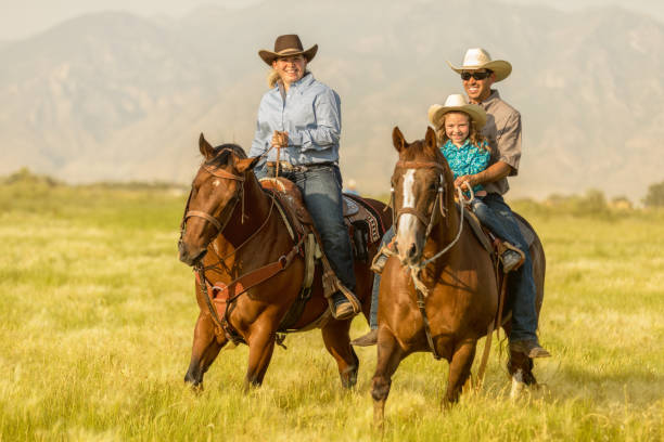 istock Father Daughter Horseback Riding 858765968